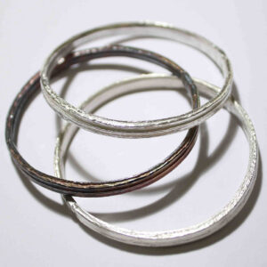 Angelica silver thick bangles by Fiona Hutchinson