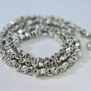 Cnnamon swirl silver small necklace by Fiona Hutchinson