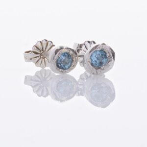 Nugget silver stud earrings with swiss blue topaz by Fiona Hutchinson