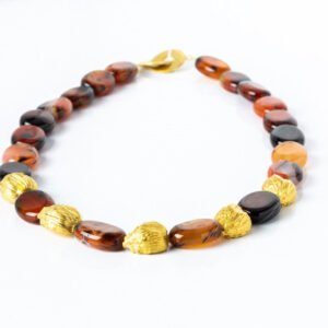 Gilded black cardamom necklace with oval burnt orange, white and black banded agate beads by Fiona Hutchinson